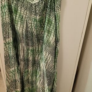 Green satin pleated skirt